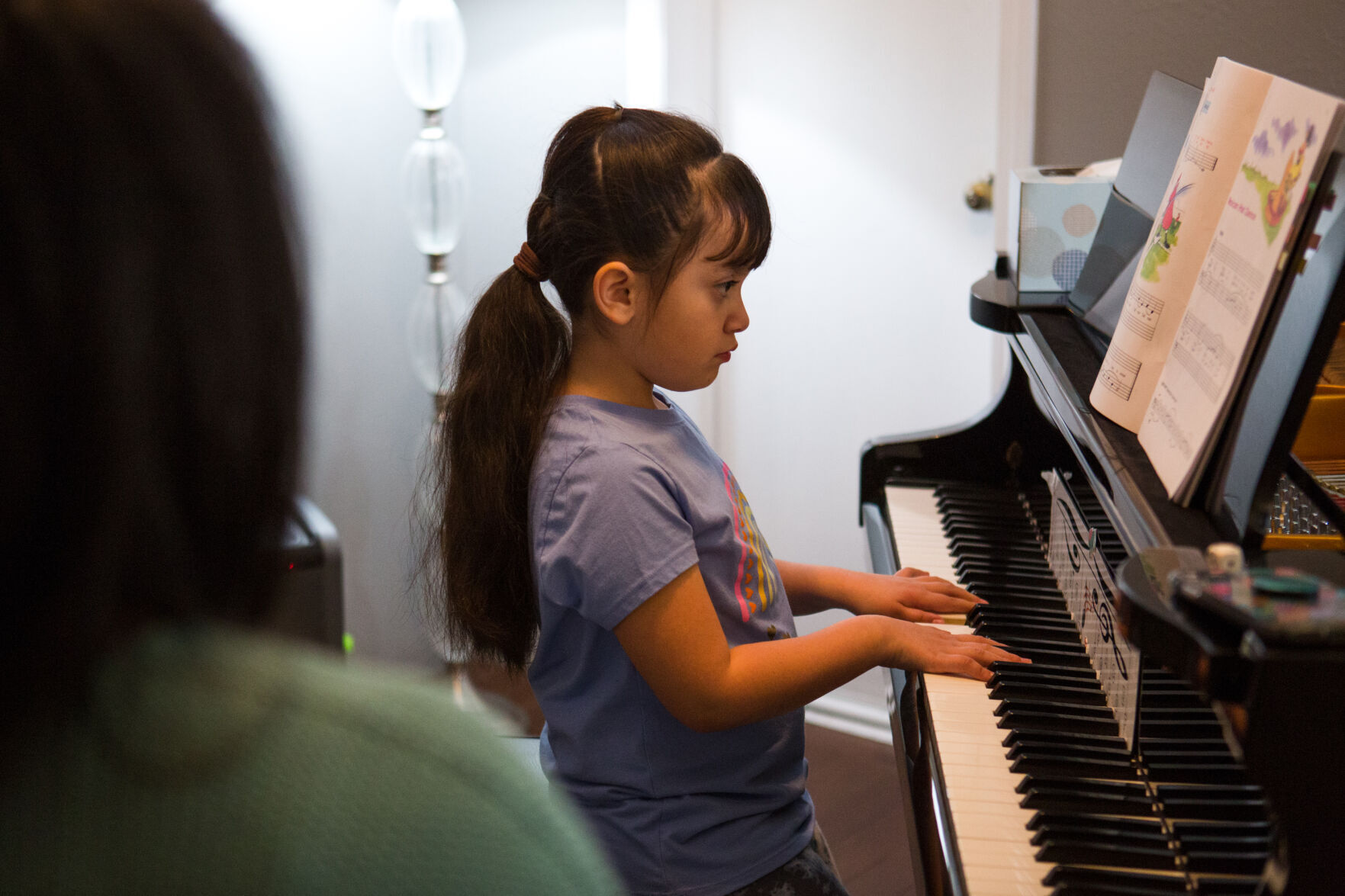 Local piano teacher shares music passion with youth